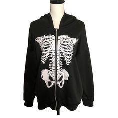 Full Zip Hoodie Skeleton On The Chest And Arms Ideal For The New Season Without Tag It Has A Dimple At The Height Of The Arm, It Is Shown In The Last Photos, It Can Be Repaired Or It Does Not Affect It, It Is Not Very Noticeable Smoke/Pet Free Home Approximate Measurements At The End Of The Photos Unisex Size:S Reasonable Offers Accepted Fast Shipping Goth Zip Up Hoodie, Halloween Black Outerwear With Skull Print, Halloween Black Skull Print Outerwear, Winter Skull Print Hoodie Outerwear, Casual Skull Print Hoodie Outerwear, Halloween Long Sleeve Outerwear With Skull Print, Skull Print Hoodie For Streetwear, Halloween Hooded Outerwear With Skull Print, Casual Skull Hoodie For Fall