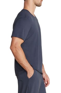 Lightweight and exceptionally soft, this stretchy T-shirt makes a great choice for the gym, a relaxing afternoon or a night of sweet, sweet slumber. Crewneck Short sleeves 91% polyester, 9% spandex Machine wash, tumble dry Imported Relaxed Crew Neck T-shirt For Loungewear, Sporty Soft-washed T-shirt For Loungewear, Cotton Crew Neck T-shirt For Lounging, Casual Crew Neck T-shirt For Loungewear, Relaxed Fit Crew Neck Top For Loungewear, Soft-washed Relaxed Fit T-shirt For Athleisure, Relaxed Stretch Cotton Tops, Comfortable Casual Solid Tops, Casual Moisture-wicking Stretch T-shirt