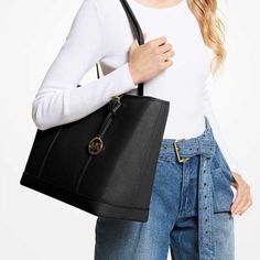 Michael Kors Jet Set Travel Large Top Zip Shoulder Tote Saffiano Leather Black Nwt 100% Authentic Style# 35f0gtvt9l Was $448.00$ Mk Note: Our Jet Set Travel Tote Is A Timeless Style For Every Season. Crafted From Saffiano Leather Accented With A Top-Stitch Trim, It Opens To A Spacious Interior With Plenty Of Room To Store All Your Essentialsbe It For A Day Or For An Entire Weekend. Use The Inside Slip Pocket To Stow Small Items That Require Easy Access. Details Tote Bag Saffiano Leather 100% Lea Saffiano Leather Shoulder Bag For Work With Branded Hardware, Classic Michael Kors Shoulder Bag For Office, Classic Michael Kors Shoulder Bag For Work, Michael Kors Black Shoulder Bag For Work, Michael Kors Saffiano Leather Office Bag, Elegant Michael Kors Shoulder Bag For Work, Elegant Everyday Michael Kors Bag, Michael Kors Saffiano Leather Everyday Shoulder Bag, Michael Kors Saffiano Leather Shoulder Bag