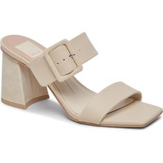 Dolce Vita Paca Ivory Leather Heeled Sandals - New In Box Wear A Timeless Classic Block Heeled Dolce Vita Paca Slip-On Style Sandals With A Textured Embossed Upper That Adds A Subtle Contrast To Any Outfit. Synthetic Upper And Lining. Memory Foam Cushioned Footbed. Slip-On Style. Buckled Strap Sandal. Heel Height: 3 12 In Chic Beige Sandals With Buckle Closure, Chic Beige Sandals With Wrapped Heel, Beige Square Toe Heels With Removable Insole, Modern Beige Heels With Buckle Closure, Feminine White Leather Sandals, Elegant Off White Leather Sandals, Elegant Off-white Leather Sandals, Cream Closed Toe Sandals With Sculpted Heel, Cream Sandals With Heel Strap And Square Toe