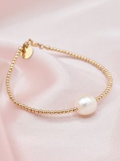 Ellie Bracelet 14k Gold-filled Bracelets With Pearl Drop, Everyday 14k Gold-filled Bracelets With Pearl Charm, Everyday 14k Gold Filled Bracelets With Pearl Charm, Everyday 14k Gold-filled Bracelet With Pearl Charm, Gold Bracelets With Pearl Drop In 14k Gold Filled, Classic Everyday Pearl Bracelet With 14k Gold Filled, Classic 14k Gold Filled Pearl Bracelet For Everyday, Classic Everyday 14k Gold-filled Pearl Bracelet, Adjustable 14k Gold Jewelry With Pearl Charm