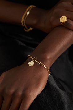 Foundrae's modern heirloom pieces are created to tell a story, starting with the meaning behind each design. Handcrafted from 18-karat gold, the 'Spade' pendant on this bracelet represents joy and abundance. It's set with a sparkling diamond at the center and hangs from the brand's 'Classic FOB Clip Chain'. Modern Jewelry Charm Bracelet, Modern Charm Bracelets Jewelry, Luxury Hallmarked Yellow Gold Diamond Bracelet, Luxury Diamond Oval Link Bracelets, Timeless Tarnish Resistant Gold Plated Bracelets, Timeless Tarnish Resistant Gold Plated Bracelet, Modern Hallmarked Jewelry For Everyday Luxury, Fine Jewelry White Gold Promise Bracelet, Luxury Engraved Diamond Bracelet