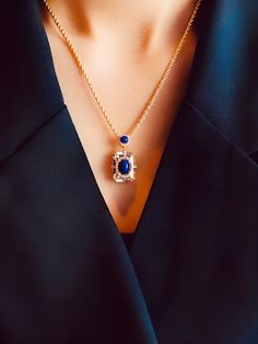 Metal: 18k gold vermeil Gemstone-  Natural Lapiz Lazuli, Natural clear Quartz Length of pendant : 26mm Width of pendant : 14mm weight: 7.4 g Free Gift- Brass Chain Length: 16" + 2" Closure: Spring clasp Formal Gold-plated Birthstone Necklace, Sapphire Jewelry With Gemstone Accents In 14k Gold, 14k Gold Jewelry With Sapphire And Gemstone Accents, Luxury Blue Locket Jewelry, Luxury Royal Blue Jewelry, Gold-plated Jewelry With Gemstone Accents, Gold Plated Oval Pendant Jewelry For Formal Occasions, Gold Plated Pendant Jewelry For Formal Occasions, Formal Lapis Lazuli Jewelry