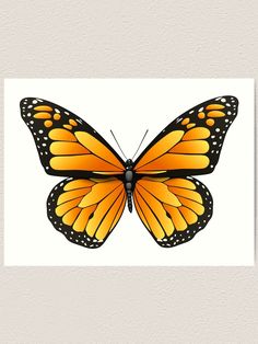 a yellow butterfly sitting on top of a white surface