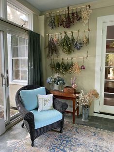 a living room filled with furniture and flowers