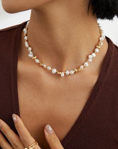 The beauty of nature shines through in this design, free from excessive embellishments to showcase the allure of natural, irregularly-shaped pearls. The vintage gold-toned silver components complement the pearls, exuding a French charm. Perfect wedding necklace for pearl lovers, and bride.  ✦ Material: 925 Silver / 18K Gold Vermeil / Natural Pearl ✦ Color: Gold ✦ Measurement: Chain length 38 cm + 6 cm extender, Pearls approximately 5-7 mm More necklace collections: https://www.etsy.com/shop/AprilJoyJewels?section_id=49789422 Discover more sparkling joys for your jewelry collection: https://www.etsy.com/shop/AprilJoyJewels ━ About Shipping ━  We provide FREE SHIPPING for all orders within the U.S. All orders are handmade with love and care, please allow 8-12 business days for processing. ━ Polished Beads Pearl Necklace For Wedding, Elegant Baroque Pearl Jewelry With Polished Beads, Elegant Baroque Pearl Beaded Necklace For Wedding, Anniversary Pearl Necklace With Polished Beads, Wedding Necklace With Polished Pearl Beads, Gift Jewelry With Polished Baroque Pearl Beads, Wedding Baroque Pearl Beaded Necklace With Pendant, Wedding Pearl Necklace With Polished Beads, Wedding Beaded Necklaces With Baroque Pearl Drop