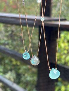 These are my best sellers at all of my markets. It is a small faceted gemstone that is hand-tied on a beige nylon cord with a sterling silver clasp. I have pictured from left to right: apatite, labradorite and chalcedony.   Let me know if you want apatite, labradorite OR chalcedony at checkout. 17 inches long.  Let me know if you need it shorter or longer. Petite is 16 inch and larger bone is 18 inch. I am wearing 17 inch in the pictures.  healing properties are: Apatite (which is the translucen Adjustable Briolette Crystal Necklace With Gemstones, Turquoise Faceted Briolette Necklaces, Adjustable Faceted Moonstone Necklaces, Adjustable Faceted Turquoise Necklace, Adjustable Faceted Moonstone Necklace, Turquoise Faceted Briolette Necklace, Adjustable Chalcedony Necklace With Natural Stones, Adjustable Teardrop Faceted Necklaces, Handmade Turquoise Briolette Necklace