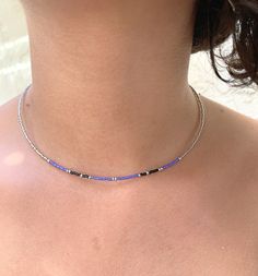 Simple, and dainty choker necklace made with quality colorful glass tiny seed beads. It features silver, lavender  purple, and black seed beads. Very light, girly and dainty, it is easy to wear on an everyday basis. We love how minimalist and simple it is, while still bringing color and fun to your look. It is shown with a  lobster clasp, but could also be made with a barrel clasp. I made it for my 10 year old daughter who loves to wear choker necklaces either on their own, or while stacking a few of them, as you can see on the pictures! It will make a great gift for your daughter, grand-daughter or best friend!! The choker can be made in 3 length: 13 inches ( very short choker), 14 inches, or 15 inches.  I strive to ship my jewelry within 2 days! Your choker will come wrapped in a white j Jewelry For Teens, Dainty Choker Necklace, Dainty Choker, White Jewelry Box, Choker Jewelry, Black Seed, Necklace Simple, Jewelry Choker, White Jewelry