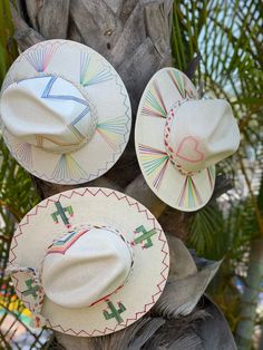 The wait is over! This hat is Ready to Ship and your order will be processed and shipped within 3-7 business days. Items with embroidery customization will be shipped within 2 weeks. White Palm Straw Hat with Pink Heart/Rainbow Fan Design by Corazon Playero. Custom designed and hand made hats by artisans in San Jose Del Cabo, Mexico. These hats are one size fits most with an elastic band inside to add comfort and fit for all head sizes. Please note, all hats come with natural braid unless custom Straw Beach Hats, San Jose Del Cabo Mexico, Rainbow Fan, Girls Crafts, Hat Burning, Custom Made Hats, Spring Hat, Hat Art, Cabo Mexico