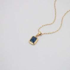 A beautiful squared royal blue stone hangs on a delicate link chain. We say this necklace is exquisite, elegant and classic. It's perfect to wear it alone or stack with a simple delicate chain. 18k gold plated Stainless steel base Waterproof and tarnish free 45cm Elegant Blue Charm Necklace With Adjustable Chain, Blue Square Pendant Necklace For Formal Occasions, Elegant Blue Necklace With Gold Chain, Blue Gold-plated Chain Necklace As Gift, Blue Gold-plated Chain Necklace With Adjustable Chain, Blue Adjustable Gold-plated Chain Necklace, Blue Gold Plated Chain Necklace As Gift, Blue Adjustable Gold Plated Chain Necklace, Elegant Blue Gold-plated Charm Necklace