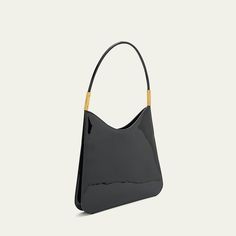 Saint Laurent "Sadie" hobo bag in patent leather  Flat shoulder strap Open top Interior, one zip pocket  Bronze hardware  Lining: Cotton Approx. 11.4"H x 12.2"W x 0.8"D Made in Italy Luxury Shoulder Bag With Glossy Finish And Double Handle, Rectangular Patent Leather Shoulder Bag With Glossy Finish, Glossy Patent Leather Rectangular Shoulder Bag, Rectangular Glossy Patent Leather Shoulder Bag, Modern Patent Leather Rectangular Shoulder Bag, Modern Rectangular Patent Leather Shoulder Bag, Luxury Glossy Finish Shoulder Bag, Top Handle Shoulder Bag With Glossy Finish For Shopping, Elegant Double Handle Shoulder Bag With Glossy Finish