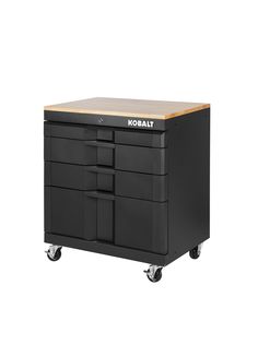 With heavy-duty construction and a powder-coated finish, this cabinet offers a durable storage solution for your garage. The 4-drawer base cabinet comes fully assembled...you only need to attach the casters, which are included. Each drawer has a weight capacity of 75lbs. the drawers are lockable for peace-of-mind security. We have included a 3/4in wood top for working on projects, crafts, etc. complete your garage suite with other pieces like the work table, small base cabinet, or a wall cabinet (each sold separately). Dimensions are 32.8-inches H, 28-inches W, and 18.5-inches D. Kobalt 28-in W x 32.8-in H x 18.5-in D Freestanding Steel Garage Cabinet in Black | 19200 Garage Suite, Freestanding Garage, Spiderman Room, Storage Shed Organization, Garage Cabinet, Shed Organization, Steel Garage, Corporate Office Design, Garage Cabinets