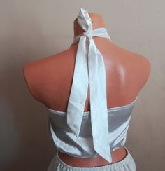 "Recycled redesigned ivory white color soft satin (little elastic) fabric crop top. satin high neck backless crop top  SİZE :: Small bust: 34\" Waist. 30 to 36\" elastic back not adjustable  back long: 14\"  Front long: 16\" under from neck band   other piece is gift with this item READY TO SHIPP Please check your registered address is up to date on Etsy There is an express shipping option (need phone number) I send your orders by Turkish Postal Service with a registered number. The items will b Crop Top Satin, Halter Blouse, Top Satin, High Neck Halter, Peignoir Sets, Womens Halter Tops, Backless Crop Top, Vintage Nightgown, Tie Crop Top