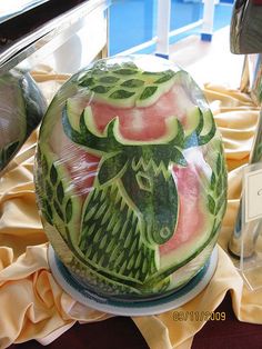 a watermelon carved to look like an animal