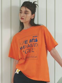 Editor's Notes The oversized shirt has lettering artwork that fits the Hawaiian theme. - Casual and kitsch mood- Oversized fit with a natural silhouette- 20 count 100% cottonMeasurements(in.)ONE SIZE- Shoulder: 16.54 in - Chest: 22.83 in. - Sleeve: 9.45 in. - Total Length: 26.77 in. Model info: Tish - Height 5' 7'' / Lisa - Height 5' 7''  Composition & Care- 100% Cotton- Dry cleaning recommended- If not, wash using a washing netDesigner- by LETTER FROM MOON Casual Orange Tops With Graphic Design, Orange Relaxed Fit Tops For Streetwear, Orange Graphic Design Tops For Summer, Orange Graphic Print Tops For Streetwear, Orange Graphic Design Top For Summer, Oversized Orange T-shirt For Streetwear, Trendy Oversized Orange T-shirt, Oversized Orange Tops For Streetwear, Orange Letter Print Tops For Streetwear