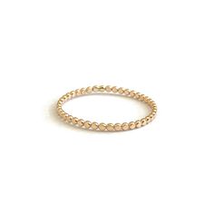 This is a 14k solid gold dot ring. It's available for size 4 to size 9. Gold Stacking Rings, Dot Ring, Bezel Earrings, Gold Dot, Gemstone Drop Earrings, Rings Collection, Evil Eye Ring, Gemstone Beaded Necklace, Gem Ring