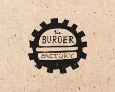 the burger factory logo on a piece of paper