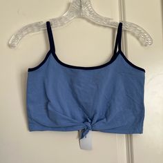 Urban Outfitters, Blue Cami Tank Top, Tie-Front, Navy Hem Detailing, Still Has Original Tags, Size S Blue Cropped Cotton Tank Top, Casual Blue Tank Top For Day Out, Casual Blue Cropped Tank Top, Blue Beach Tops By Urban Outfitters, Urban Outfitters Cotton Stretch Tank Top, Urban Outfitters Stretch Cotton Tank Top, Urban Outfitters Blue Beach Tops, Urban Outfitters Blue Tops For Beach, Casual Blue Cotton Crop Top