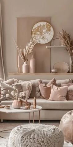 a living room filled with lots of furniture and decor on top of a white rug