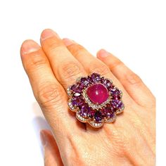 Cluster Multi Color Fancy Gems from Sri Lanka Ruby - 6 Carat Amethyst - 9 Carat White Topaz - 1 Carat  This Ring is from the  “Flamenco”  traveling collection are the epitome of elegance and versatility. It offers a perfect blend of day to night and swimwear to evening wear, allowing you to effortlessly transition between different occasions and outfits. Wearing these spectacular oriental-style ring will undoubtedly make you the center of attention. It adds a touch of glamour and sophistication to your favorite caftans, swimwear, or evening attire, enhancing your overall look. The  “Flamenco”  collection, from which this ring originates, showcases exceptional craftsmanship and incorporates natural gemstones. The ring is set in 18k gold and silver, guaranteeing its quality and durability. I Luxury Multi-stone Pink Gemstones, Luxury Pink Multi-stone Gemstones, Luxury Multi-stone Rings For Party, Luxury Pink Amethyst Ring For Formal Occasions, Luxury Multi-stone Amethyst Ring For Weddings, Luxury Multi-stone Amethyst Wedding Ring, Luxury Purple Rings For Party, Luxury Purple Party Rings, Luxury Ruby Ring For Party