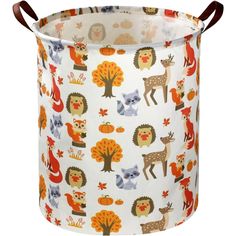 a white and orange basket with woodland animals on it