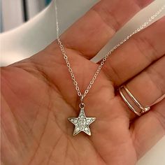 Brand New Without Tags And Absolutely Gorgeous Describes This Authentic Coach Small Pave Crystal Star Pendant Beautifully Displayed On This Genuine .925 Sterling Silver Necklace. Designer Trademark Stamped Coach On Backside Of Pendant. Measures 18”-20” In Length. Lobster Claw Clasp. Bundle And Save Now! Silver Star Charm Necklace With Clavicle Chain, Sterling Silver Star Charm Necklace With Clavicle Chain, Elegant Coach Sterling Silver Jewelry, Coach Elegant Sterling Silver Jewelry, Coach Sterling Silver Jewelry, Sterling Silver Necklace With Star Charm For Anniversary, Coach Silver Jewelry, Coach Sterling Silver Jewelry As A Gift, Silver Star Charm Necklaces For Anniversary