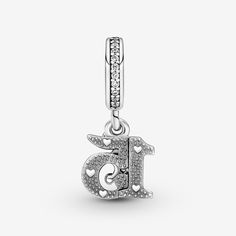 Celebrate a sweet 15th birthday with the 15th Birthday Dangle Charm. Hand-finished in sterling silver, this charm includes the number 15 with a polished front and back with micro beads and heart-shaped bead details, plus a small crown-shaped dangle with pavé on the front and pavé on the bail. Inspired by Quinceañera, the celebration of a 15-year-old girl's birthday rooted in Spanish and indigenous cultures, this charm is a sweet and stylish way to mark the moment. - Pandora 15th Birthday Dangle Number 15, Micro Beads, Bracelet Pandora, Pandora Bracelet Charms, Custom Pendants, 15th Birthday, Pandora Bracelets, Dangle Charms, Pandora Bracelet