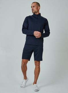 This 4-way stretch short will keep you warm on brisk days while allowing for exceptional range of motion. Breathable, soft, and super comfortable. Models is 6'1" and wears size 32. Care: Machine wash cold, tumble dry low, do not bleach, do not dry clean Composition: 84% Polyester | 16% Elastane Navy Activewear With Built-in Shorts For Training, Sporty Navy Activewear For Outdoor Activities, Navy Activewear With Built-in Shorts, Navy Moisture-wicking Functional Bottoms, Navy Athleisure Activewear For Outdoor, Navy Functional Moisture-wicking Bottoms, Functional Navy Moisture-wicking Bottoms, Navy Moisture-wicking Activewear For Outdoor, Navy Outdoor Athleisure Activewear