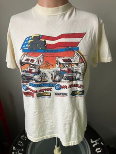 Very rare Sprint Specialties Racing t-shirt from the mid 80's. Size medium single stitched tee featuring the team of Chris Weatherby, Ronnie Myers and Jim Murray, great shape, no holes or stains. Measures 19" pit to pit, 23" collar to bottom. American Retro Short Sleeve Cotton T-shirt, American Retro Cotton Crew Neck T-shirt, Vintage Graphic Print T-shirt For Sports Events, Vintage Shirt With Front Print For Fans, Vintage Crew Neck Fan Merchandise T-shirt, American Retro Short Sleeve Graphic T-shirt, American Retro Short Sleeve T-shirt With Graphic Print, Vintage Crew Neck T-shirt For Fan Merchandise, American Style Graphic Print T-shirt For Streetwear