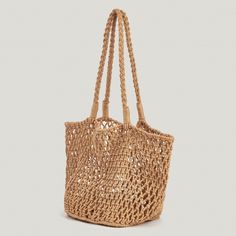 Elevate your accessory game with the Cupshe Women's Tan Open Weave Tote Bag. This chic tote is meticulously crafted to blend style with practicality, featuring an open weave design that exudes a relaxed charm, perfect for various occasions.

- Material: Durable, lightweight fabric
- Color: Elegant tan
- Size: One size fits all
- Gender: Female
- Age Group: Adult

Ideal for beach outings, casual shopping trips, or brunch with friends, this tote offers ample space to carry all your essentials whil Brown Braided Bags For Beach Season, Trendy Braided Beige Crochet Bag, Beige Braided Crochet Bag, Brown Braided Beach Bag For Summer, Braided Shoulder Bag For Beach, Brown Braided Beach Bag, Summer Brown Braided Beach Bag, Chic Brown Braided Beach Bag, Braided Tote Beach Bag For Everyday Use