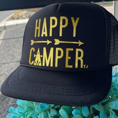 Black Mesh Snap Back Trucker With Gold Glitter Writing Adjustable Black Trucker Hat For Camping, Fun Black Trucker Hat For Outdoor, Casual Black Trucker Hat For Camping, Black Winter Camping Hat, Fun Black Outdoor Hats, Fun Black Hat For Outdoor, Fun Black Outdoor Hat, Casual Black Hat For Camping, Black Trucker Hat With Letter Print For Outdoor