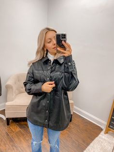 Our Oversized faux leather Casual shacket features a button up closure with a collard neckline and side pockets on the chest! Perfect to through on over a basic top or wear as a full shirt with a pair of jeans! 55% Polyester, 45% Polyurethane Model is wearing a Small Runs true to size! *For more info on model measurements checkout our model sizes page!* MADE BY: VERY J MODEL MEASUREMENTS: Top: XS-S Bottom: 00-0 Height: 5'2" Shoe Size: 6.5 Bra Size: 32B Trendy Fall Leather Jacket With Faux Pockets, Edgy Collared Fall Outerwear, Edgy Collared Outerwear For Fall, Chic Button-up Shacket With Pockets, Trendy Faux Leather Collared Jacket, Chic Fall Leather Jacket With Flap Pockets, Chic Leather Jacket With Flap Pockets For Fall, Black Utility Jacket With Buttoned Pockets For Fall, Chic Collared Outerwear With Faux Pockets