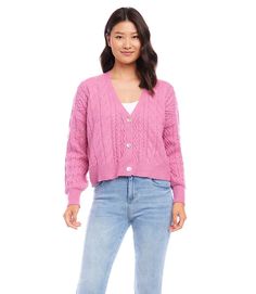 Richly textured yarns create a polished cable knit pattern over this cardigan sweater that is sure to become a wardrobe essential. Cable Stitch