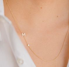 Beautifully handcrafted 14k solid gold asymmetrical initial and a small bezel diamond on a dainty cable link chain necklace, available in 14k yellow gold, white gold, and rose gold. This stunning piece will be you new favorite necklace. Wear it with your initial, or your loved one's.Made in L.A.Please note placement initial chart when selecting initialsInitial Size: Approx. 6mmBezel diamond: 0.03 ct. twClarity: VSWeight : Approx. 2 gramsShips in 4-8 business daysComes gift ready in a beautiful c Elegant Diamond Initial Necklace With Cable Chain, White Gold Initial Necklace With Cable Chain, Fine Jewelry 14k Gold Diamond Necklace With Initials, Elegant White Gold Initial Necklace With Delicate Chain, Personalized Minimalist Diamond Necklace, Elegant Initial Necklace With Cable Chain For Anniversary, Minimalist Diamond Initial Necklace, Elegant Anniversary Initial Necklace With Cable Chain, Elegant Anniversary Initial Necklace On Cable Chain