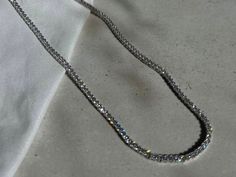 "Welcome to my store! I invite you to enjoy our massive holiday gift sale!! Up to 20% off + free worldwide shipping!! This gorgeous Dainty Rhinestone Choker Necklace is the perfect piece of jewelry to add a touch of elegant style.  It can also be perfect as a dainty bridal necklace or great holiday gift ideas for someone you love! ♦ Material ♦ - The choker necklace is made of 100% 925 sterling silver with rhodium plated. - Cubic Zirconia stones inlaid. ♦ Sizes ♦ Necklace length: 13.8\" (35 cm) + 2.4\" (6cm) Necklace width:  0.1\" (0.2 cm)  NOTES ♦ Each jewelry item is expertly handcrafted with great care and completed as swiftly as possible, typically within 1-5 business days. ♦ Each product is elegantly packaged in a designed gift box, ready to be presented to your loved one.  A blank car Silver Crystal Tennis Necklace With Clavicle Chain, Silver Tennis Necklace Choker For Party, Silver Tennis Necklace With Rhinestones, Silver Tennis Choker Necklace For Party, Silver Choker Tennis Necklace For Party, Silver Cubic Zirconia Tennis Choker Necklace, White Gold Crystal Tennis Necklace Gift, Gift Tennis Necklace With Rhinestones, Silver Tennis Necklace With Clavicle Chain For Wedding