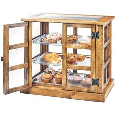 a wooden display case filled with lots of pastries