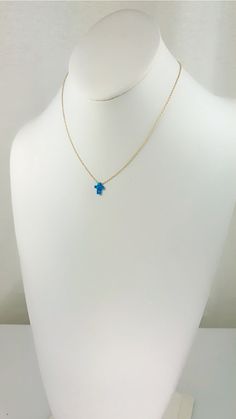 Description Simple. Chic. Minimalist™   A perfectly dainty brilliant synthetic fiery blue opal cross is floating freely on a delicate feminine 14k gold plated over Sterling silver chain.   This cute and tiny star charm necklace features a synthetic created blue opal moon stone with sterling silver chain. This lovely st Delicate Feminine, Star Charm Necklace, Silver Link Chain, Tiny Star, Simple Chic, Cross Charms, Opal Necklace, Star Charms, Moon Stone