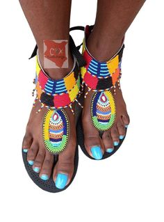 Beautifully designed African gladiators, beaded sandals, Masai sandals, summer sandals, African sandals Made from fine leather and very fine beads. Available in all sizes. Wholesale is available upon request at a discount price. Shipping is via DHL EXPRESS with a GUARANTEED delivery between 3-5 days worldwide. **BUY MULTIPLE ITEMS, PAY SHIPPING ONCE** FREE SHIPPING FOR ALL ADDITIONAL ITEMS IN YOUR CART Check out more sandals from the store. variety to chose from https://www.etsy.com/shop/CaribuK Summer Beaded Ankle Strap Sandals, Beaded Ankle Strap Sandals For Summer, Summer Festival Embellished Sandals, Multicolor Beaded Barefoot Sandals For Vacation, Traditional Multicolor Ankle Strap Sandals, Summer Beaded T-strap Sandals With Open Toe, Beaded T-strap Sandals With Open Toe For Summer, Summer Beaded T-strap Open Toe Sandals, Summer Adjustable Beaded T-strap Sandals