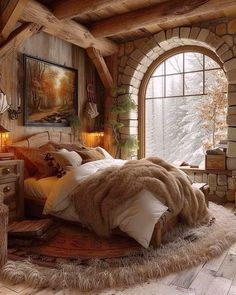 a large bed sitting in a bedroom next to an arched window with lights on it