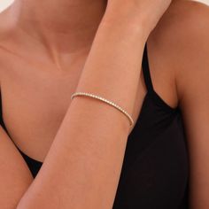 ✥ Embrace everyday elegance with our Round Cut Diamond Flexible Bracelet Bangle. Designed for daily wear, this exquisite bangle features sparkling round cut diamonds set in a flexible, comfortable design. Crafted from premium materials, it offers durability without compromising on style. Perfect for any occasion, this bracelet adds a touch of sophistication to your look. Whether as a gift or a personal treat, it's a timeless piece that enhances your everyday charm and grace. Center Stone Details:Stone Type: MoissaniteStone Cut: Round Cut Stone Total Weight: 0.9ctColor: DEFClarity: VVSMake: Hight Quality Craftmanship Metal Details:Metal Type: Solid GoldMetal Purity: 10K | 14K | 18KMetal Tone: Yellow | Rose | White Bracelet Details:Bracelet Length: 5 Inches | 5.5 Inches | 6 Inches | 6.5 Inch Flexible Bracelet, Daily Wear Jewellery, White Bracelet, Everyday Elegance, White Bracelets, Comfortable Design, Bracelet Bangle, Engagement Ring Wedding Band, Round Cut Diamond