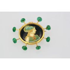 This is part of Chairish’s Fine Jewelry assortment.  Renaissance Brooch with Emerald accents in 18K Yellow Gold  Renaissance Brooch with Emerald accents in 18K Yellow Gold First of all, this brooch started out as a Vintage button which I turned into a brooch with an 18K gold rim and Emerald accents.  Also, the brooch is 45MM round with 8 Emerald Beads in a sputnik style.  Finally, this unique brooch weighs in at 11.20 grams.  Please reference the measurements noted in the description above for t Luxury Cabochon Brooch, Luxury Round Cabochon Brooch, Luxury Cabochon Brooches For Anniversary, Luxury Round Cabochon Brooches, Luxury Anniversary Brooches With Cabochon, Yellow Gold Enamel Brooches Hallmarked, Luxury Oval Cabochon Brooches, Luxury Cabochon Pendant Brooch, Fine Jewelry Pendant Brooches With Jewels