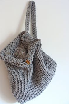 Knit cotton rope backpack with lining. Casual Crochet Bag For Everyday Winter Use, Casual Winter Crochet Bag For Everyday Use, Casual Winter Hobo Bag For Travel, Casual Winter Hobo Bag For Everyday Use, Casual Winter Hobo Bag, Knitted Tote Bag For Everyday Use, Everyday Knitted Bags, Trendy Hand Knitted Everyday Bags, Trendy Everyday Hand-knitted Bags