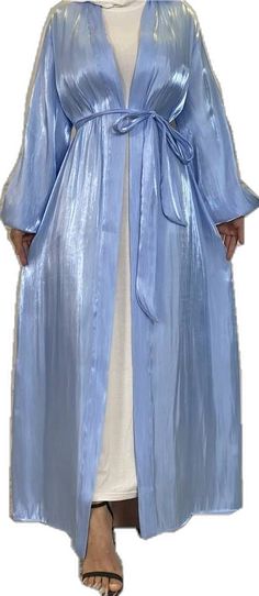 Spring Blue Long Sleeve Abaya, Elegant Long Abaya For Spring, Formal Spring Abaya With Long Sleeves, Blue Maxi Length Abaya For Spring, Spring Formal Long Sleeve Abaya, Blue Long Sleeve Thobe For Spring, Spring Formal Fitted Abaya, Fitted Abaya For Spring, Fitted Long Abaya For Spring