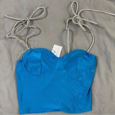 New With Tags!! Good For Going Out. Blue Sleeveless Crop Top For Party, Sleeveless Blue Crop Top For Party, Spring Party Tube Top With Straps, Blue Fitted Crop Top With Straps, Fitted Blue Crop Top Tube Top, Fitted Blue Crop Top With Straps, Blue Strapless Crop Top For Night Out, Blue Sleeveless Top For Party Season, Strapless Blue Crop Top For Night Out