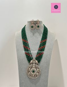 Emerald Victorian Polki Kundan Necklace/Indian Long Necklace/Statement Necklace/Long Mala/Semi Precious Necklace/Rani Haar/Pakistani jewelry Kundan Mala Pendant Set With 2 Tone Plating Length = 18 Inch Kundan Pendant Set Height = 90 mm || Width = 70 mm Earring Height = 46 mm Ships from California in 1 business day and delivery within 2-5 business days in the USA.  Color, shades, and texture displayed may vary slightly from the actual product due to digital image limitations. We request that you consider these minor variations. Please expect the possibility of some slight imperfections when buying handmade jewelry.  Please let me know if you have any questions. Arrives in a gift box. Thank you so much for visiting my shop. Silver Beaded Necklace With Stone Work For Celebrations, Silver Emerald Necklace With Stone Work For Festive Occasions, Silver Beaded Necklaces With Stone Work For Celebration, Festive Silver Emerald Necklace With Stone Work, Silver Necklace With Cutdana Round Beads, Traditional Round Kundan Necklace With Polished Beads, Traditional Kundan Necklace With Polished Beads, Traditional Silver Necklace With Emerald Stone Work, Traditional Silver Emerald Necklace With Stone Work