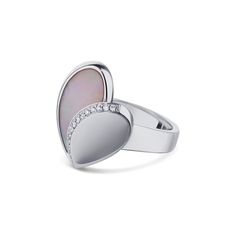 A sweet heart design by Movado featuring a mother of pearl and round diamonds. The mother of pearl is set in half of the heart as diamonds line the edge and center of the heart. Details: SIZE: 18 White gold 1/2 Pink Mother of Pearl Design: Heart Shape 15 Diamonds Cut: Round Color: G Clarity: VS-1 Total Carat Weight: 0.05cts The Pink Mother of Pearl and Diamond Movado Heart Ring is available at Burdeen's Jewelry. We have many unique offerings of estate jewelry listed on our Etsy store. Consider b Elegant Polished Heart Ring For Wedding, Elegant Heart Ring With Polished Finish For Wedding, Elegant White Gold Heart Ring With Polished Finish, Elegant Double Heart Rings For Formal Occasions, Luxury White Gold Heart Ring, Elegant Heart-shaped Mother Of Pearl Jewelry, Luxury Mother Of Pearl Rings For Wedding, Luxury Mother Of Pearl Wedding Ring, Elegant Mother Of Pearl Jewelry For Valentine's Day