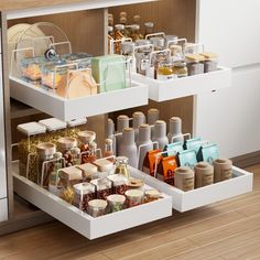 an organized kitchen drawer is shown with dishes and condiments in the bottom section