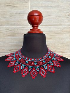 This choker is a unique piece made entirely by hand, in a very colorful boho style, to wear on any occasion. This choker has a unique design, made especially for you, perfect to wear at parties or as a special gift. Shipped anywhere in the world. Red Handwoven Beaded Necklace For Festivals, Handwoven Red Beaded Necklace For Festivals, Red Handwoven Beads For Festival, Handwoven Red Beads For Festival, Colorful Boho Style, Colorful Boho Fashion, Mexican Necklace, Colorful Choker, Huichol Art