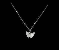 This pretty sterling silver butterfly pendant hangs delicately from a satellite chain and will arrive beautifully presented in a MaddisonDesigns box complete with tissue paper ready to give as a gift or as a treat to yourself. The butterfly has become a metaphor for transformation and hope across cultures making this necklace the perfect gift. Silver Minimalist Butterfly Necklace With Adjustable Chain, Silver Delicate Butterfly Necklace, Silver Butterfly Necklace With Delicate Chain, Silver Delicate Butterfly Necklace With Delicate Chain, Delicate Silver Butterfly Necklace, Silver Sterling Butterfly Necklace With Adjustable Chain, Silver Butterfly Necklace With Delicate Sterling Chain, Sterling Silver Butterfly Necklace With Adjustable Chain, Dainty Silver Butterfly Charm Necklace