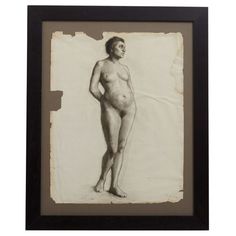 an old photo of a naked man with no shirt standing in front of a white background